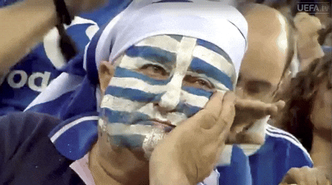 Man Painted With Greece Flag On His Face GIF