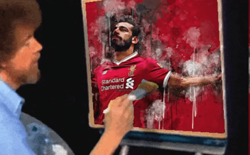 Man Painting Man In Red Standard Chartered Shirt GIF