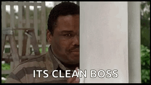 Man Peeking Behind Pole Saying Its Clean Boss
