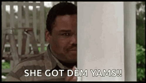 Man Peeking From Behind Porch Post Saying She Got Dem Yams GIF