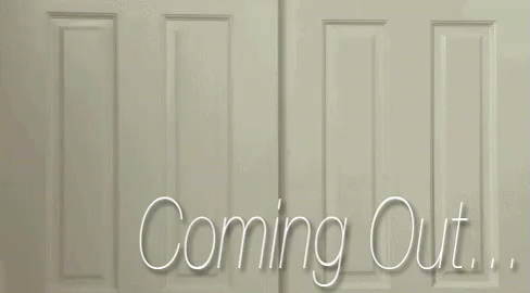 Man Peeking Out Of Coming Out Door GIF