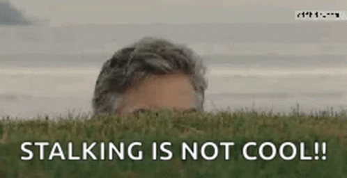 Man Peeking Out of Grass Stalking Is Not Cool