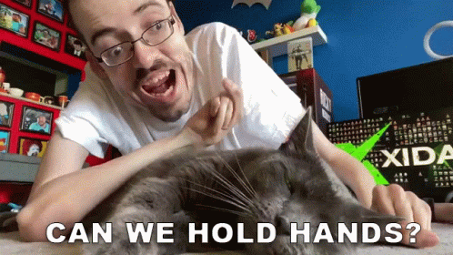 Man Petting Cat Saying Can We Hold Hands