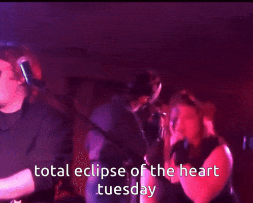Man Photographs Woman Singing Total Eclipse of the Heart Tuesday