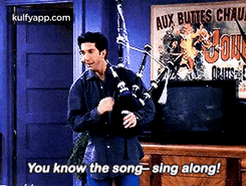 Man Playing Bagpipe Saying Sing Along