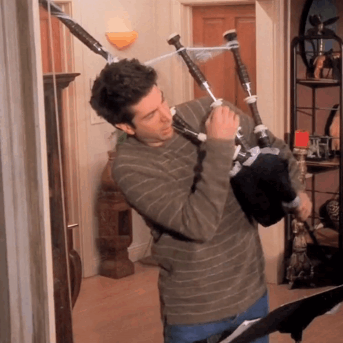 Man Playing Bagpipe