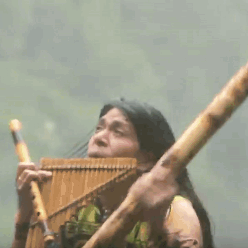 Man Playing Bamboo Flute