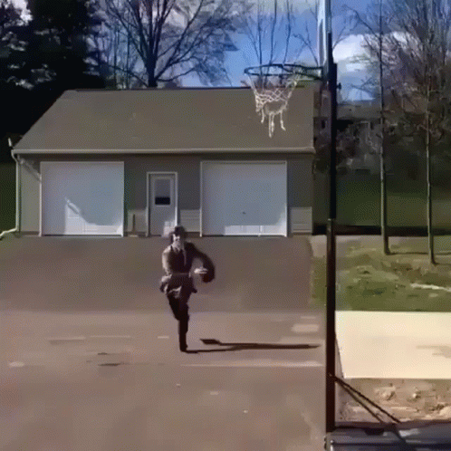 Man Playing Basketball