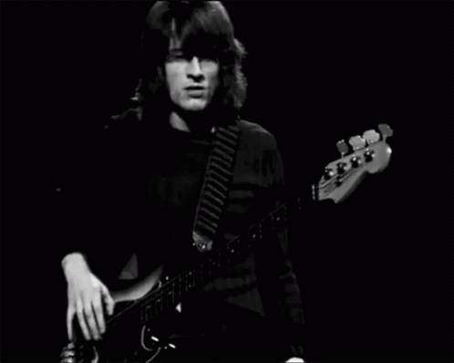 Man Playing Bass Guitar
