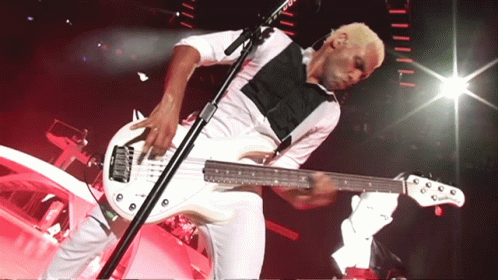 Man Playing Bass Guitar