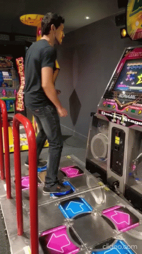 Man Playing Dancing Stage Game