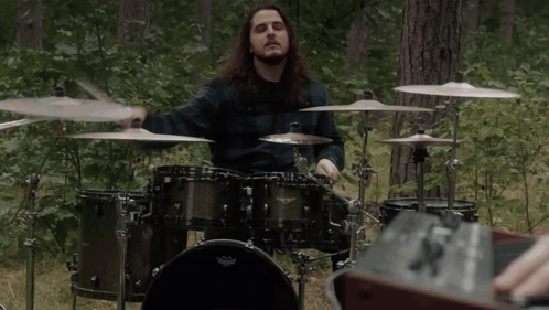Man Playing Drum Set With Remo Head