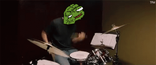 Man Playing Drums With Cartoon Face on Head