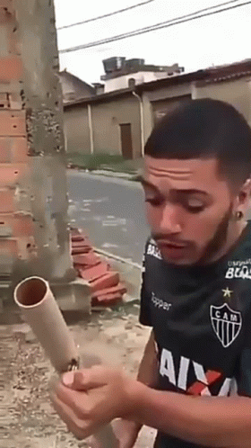 Man Playing Firework GIF
