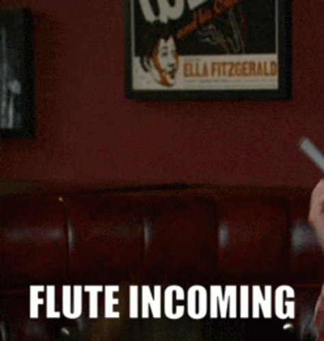 Man Playing Flute With Flute Incoming GIF