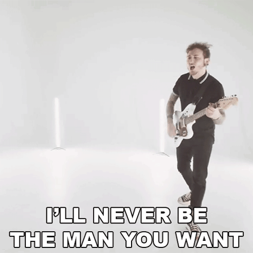 Man Playing Guitar and Singing
