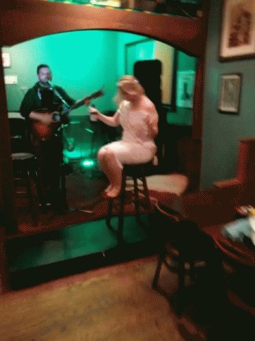 Man Playing Guitar And Woman Singing GIF