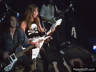Man Playing Guitar On Stage Before Crowd GIF