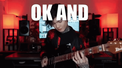 Man Playing Guitar Saying Ok