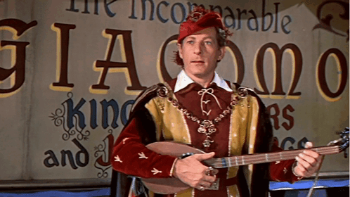 Man Playing Guitar Saying The Incomparable Giacomo GIF