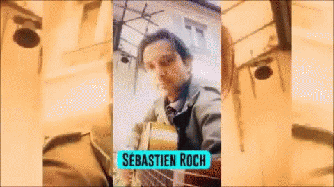 Man Playing Guitar Sebastien Roch GIF