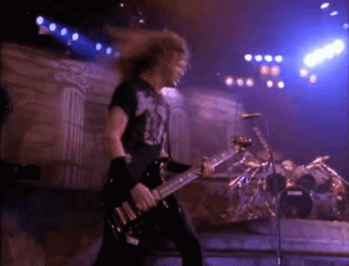 Man Playing Guitar Singing In Metallica Shirt GIF