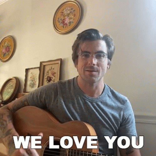 Man Playing Guitar We Love You