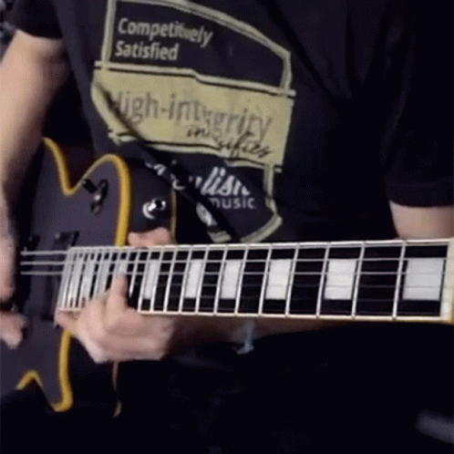 Man Playing Guitar With Competitively Satisfied Shirt