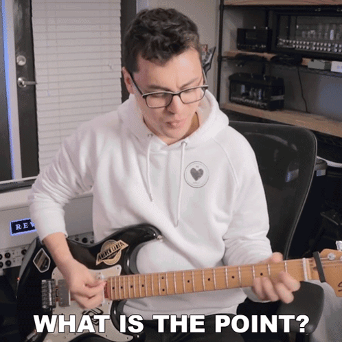 Man Playing Guitar With Words What Is the Point