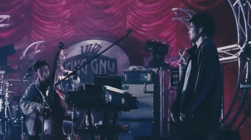 Man Playing Keyboard by King Sign