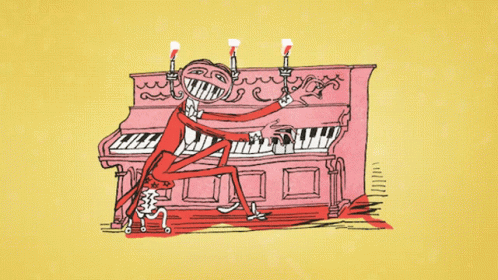 Man Playing Piano With Candles