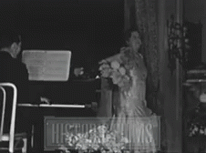 Man Playing Piano Woman Singing