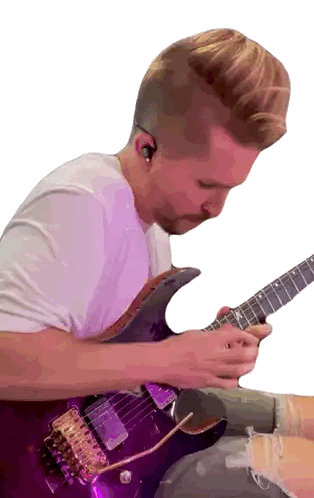 Man Playing Purple Guitar