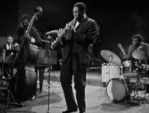 Man Playing Saxophone on Stage