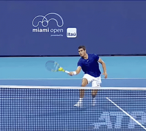 Man Playing Tennis At Miami Open Banner GIF