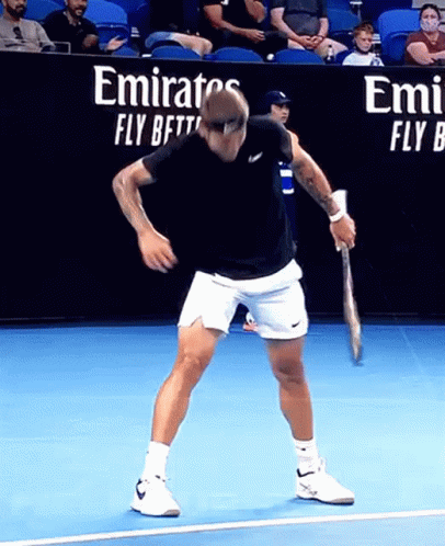 Man Playing Tennis Behind Fly Better Wall