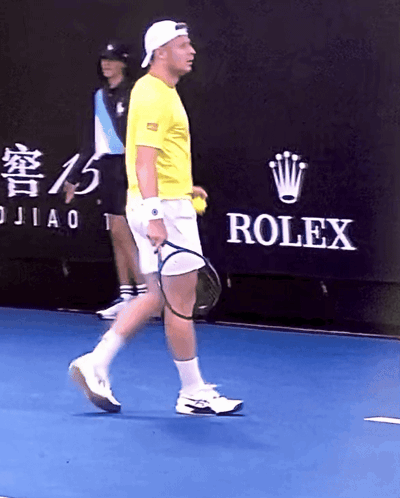 Man Playing Tennis In Front Of Rolex Banner GIF