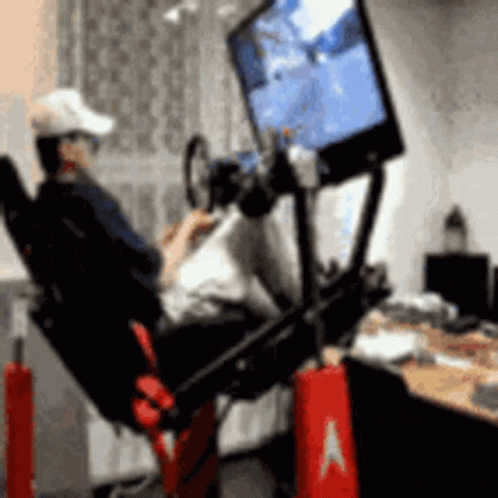 Man Playing Video Game on Computer