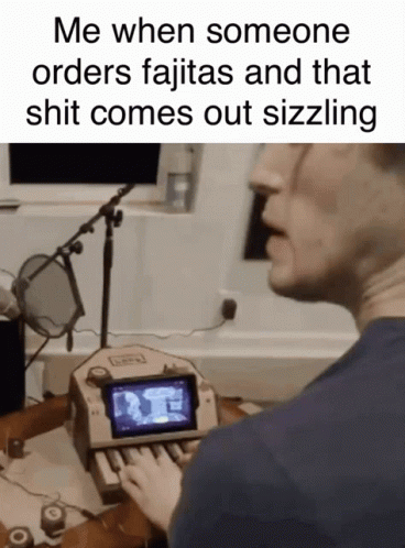 Man Playing Video Game on Homemade Keyboard