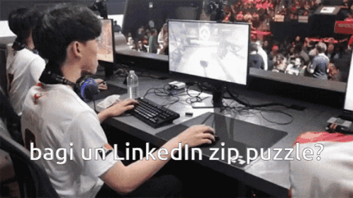 Man Playing Video Game with Bagi Um LinkedIn Zip Puzzle