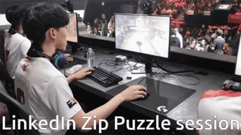 Man Playing Video Game with LinkedIn Zip Puzzle