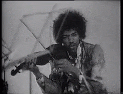 Man Playing Violin On Stage Black And White GIF