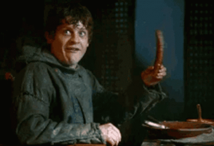 Man Playing With Sausage GIF