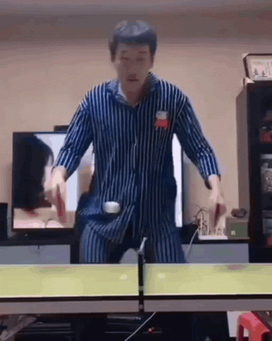 Man Plays Fast Paced Table Tennis GIF