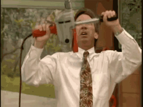 Man Plays With Drill Tool GIF