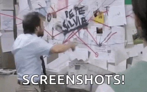 Man Pointing at Bulletin Board With Spider Screenshots