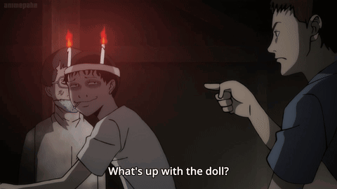 Man Pointing at Candle Head Doll