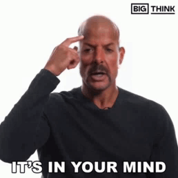 Man Pointing at Forehead Saying It's in Your Mind