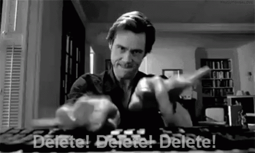 Man Pointing at Keyboard Delete Words