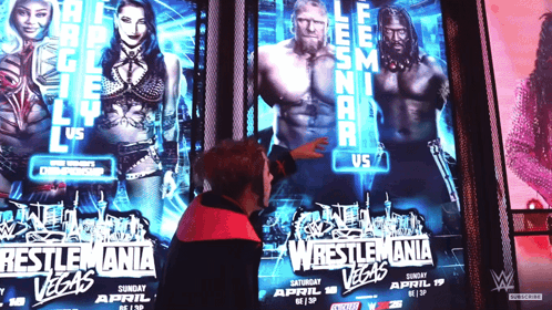 Man Pointing at Wrestlemania Poster in Las Vegas